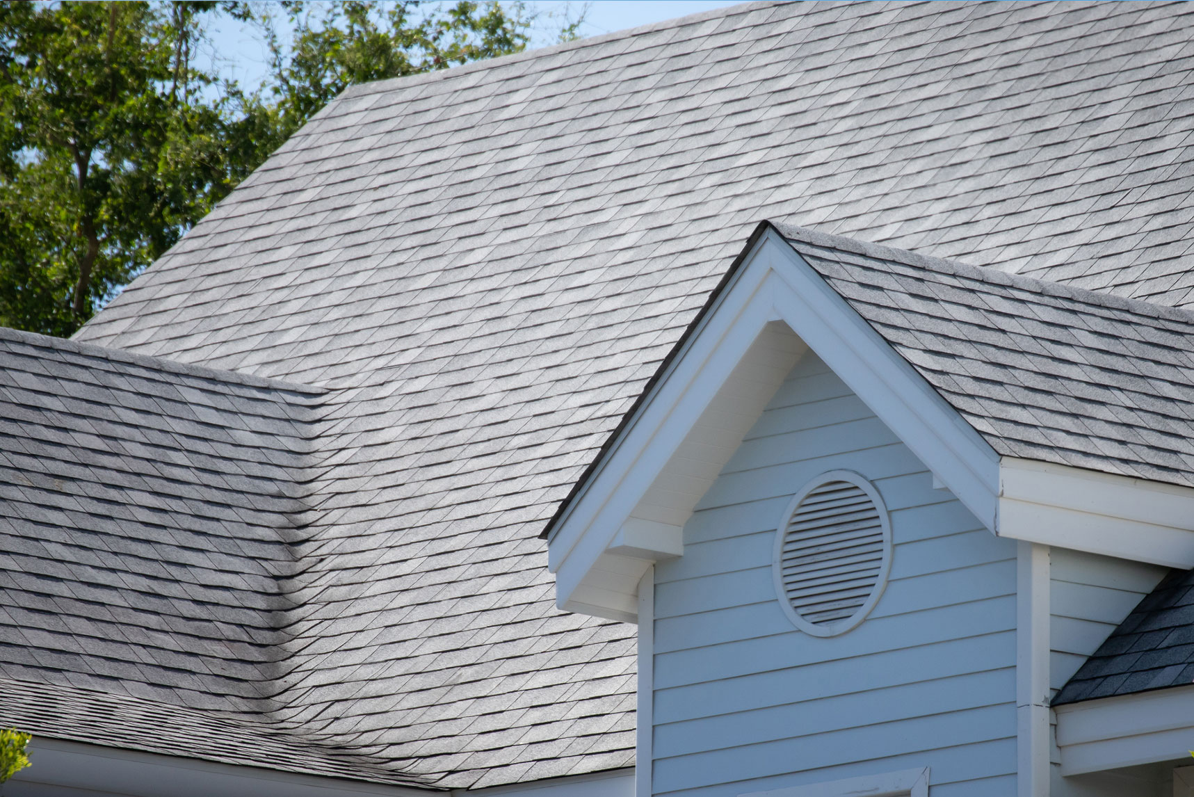 Architectural shingle roof with gable vent detail