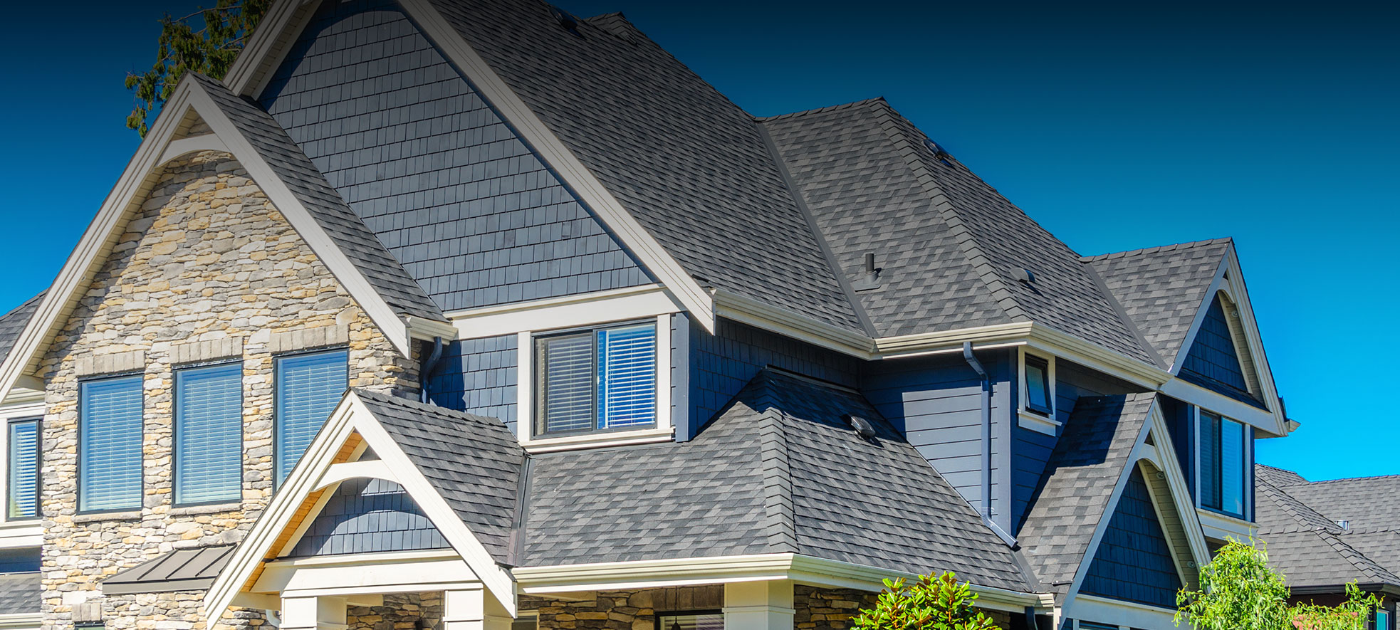 Steep gable roof with new architectural shingles