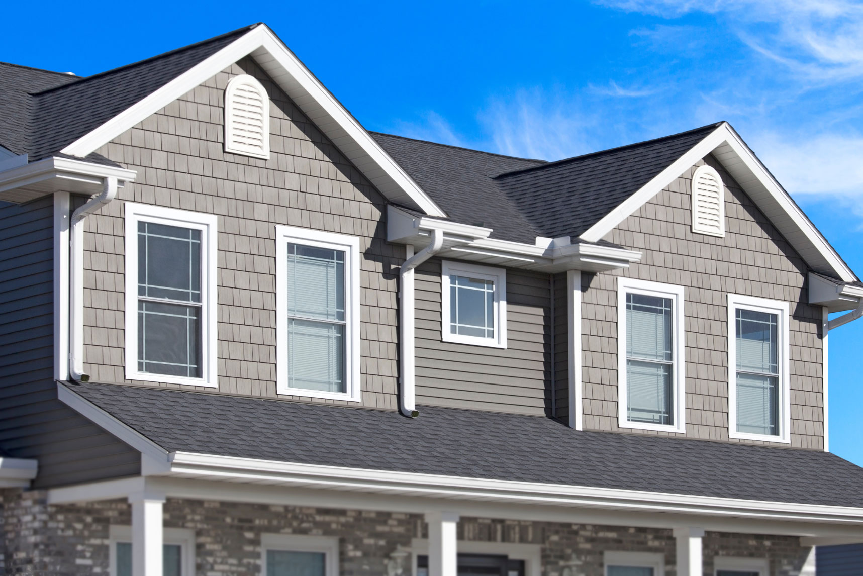 Completed shingle and stone elevation on a new home
