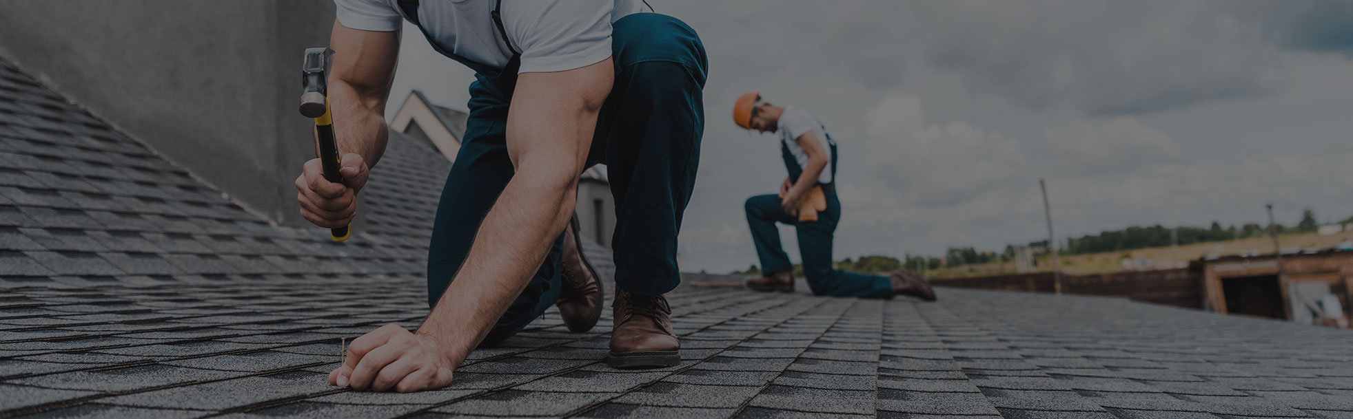 Roofer installing shingles during a replacement